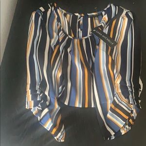 A loose fitting long sleeve blouse